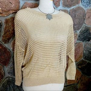 Pretty gold tone loose knit sweater